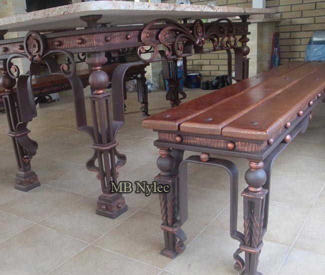 A set of wrought garden furniture