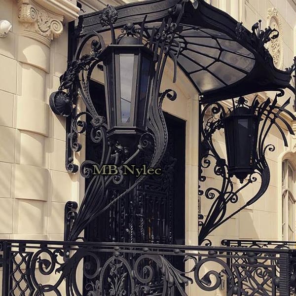 An exclusive massive forged canopy with lamps - Art Nouveau