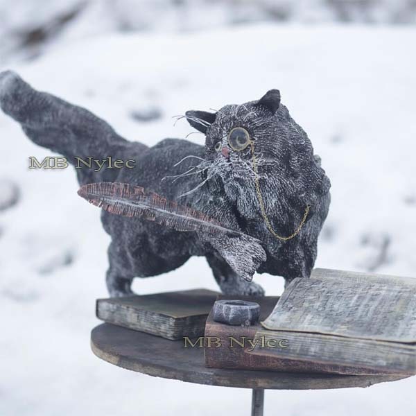 Metal scientist cat figure